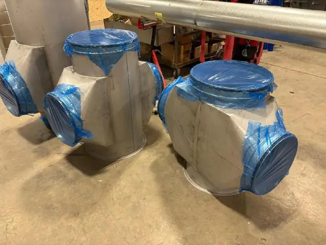 Multi-outlet paint-grip fittings built on the shop floor